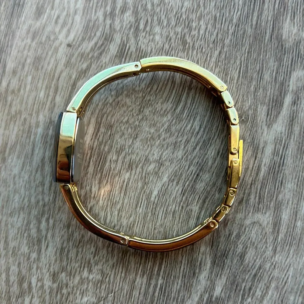 Armitron Diamond Now Blue Dial Gold Tone Bangle Watch